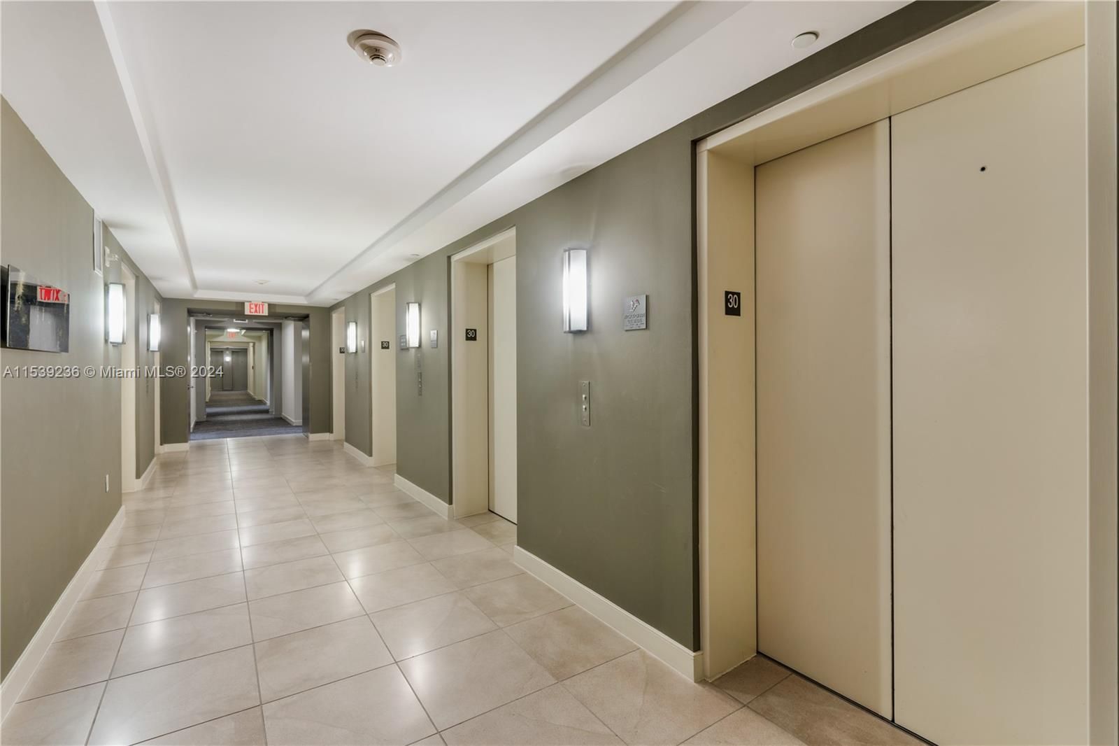 Hallway with 5 elevators