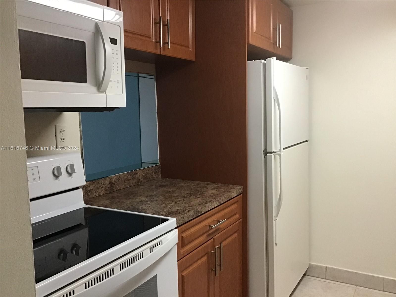 Dishwasher, updated cabinetry/counter tops