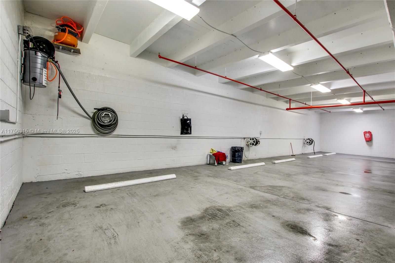 Car wash area located in under-building parking garage