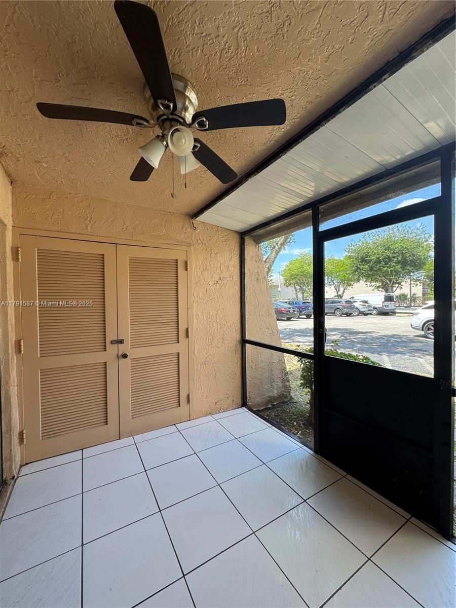 Screened in with Laundry Room. Access to your parking space is steps away.