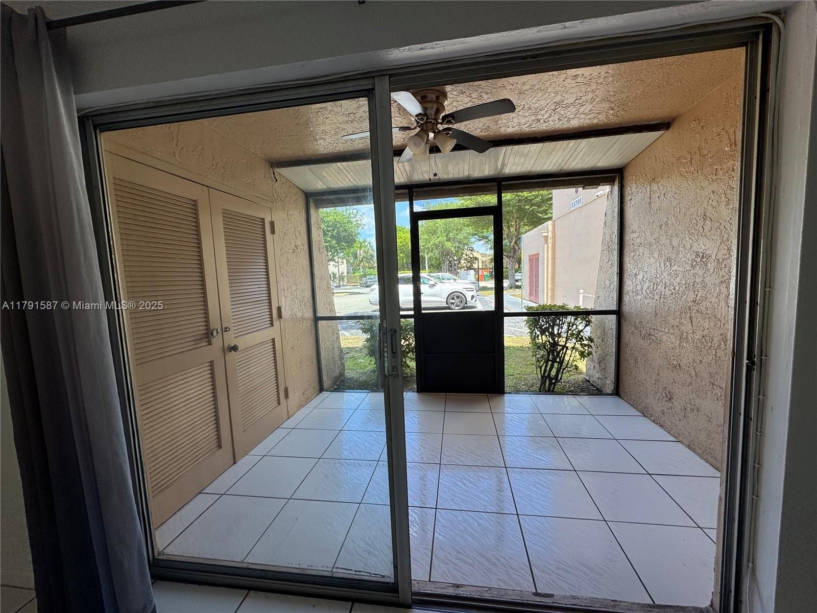 Screened in with Laundry Room. Access to your parking space is steps away.