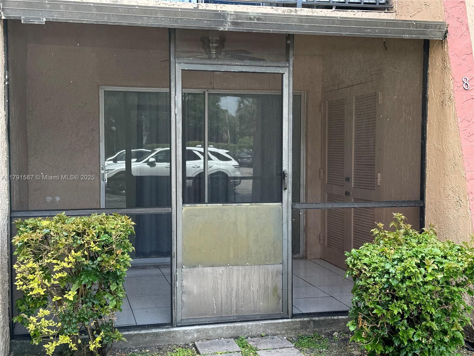 Screened in with Laundry Room. Access to your parking space is steps away.
